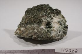 Tacharanite