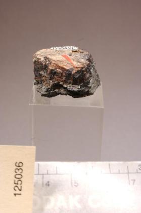 Tombarthite-(Y)