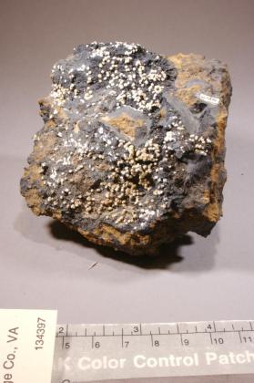 Churchite-(Y) with Goethite and mn oxides