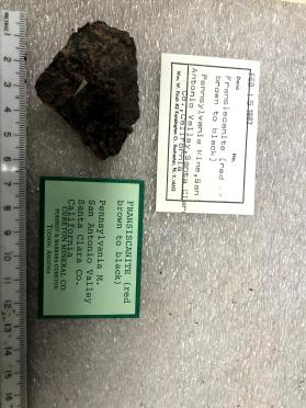Fransiscanite (red brown to black)