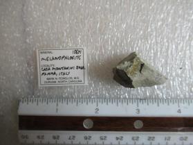 Melanophlogite
