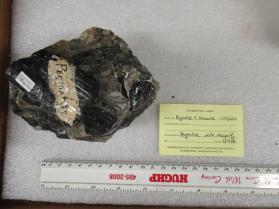 Pegmatite with Muscovite Biotite/Pyrargarite?