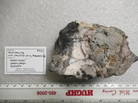 Monimolite with Calcite (questionable in IMA)