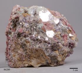 ELBAITE with Albite and Lepidolite and microlite (or zircon) and montebrasite? and Quartz and SPODUMENE