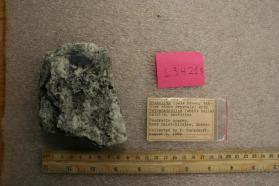 Steacyite with CALCITE and Pectolite and Tetranatrolite