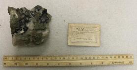 Scapolite, mica, magnetite, and calcite