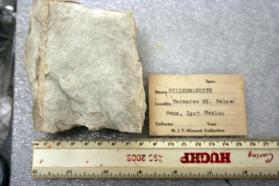 Hillebrandite