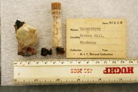 Tarbuttite crystals in vile on matrix