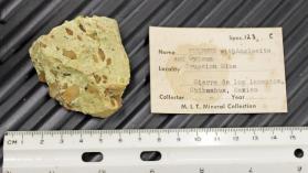 Sulfur, massive containing Anglesite crystals
