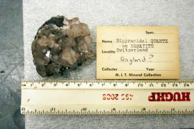 Quartz var. Bipyamidal Quartz on Hematite