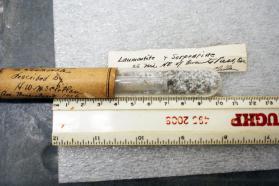 Laumontite and Serpentine powder in glass vials