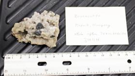 Bournonite ps. after Tetrahedrite crystals on Quartz crystals