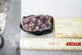 Quartz var. Amethyst crystals on Magnetite